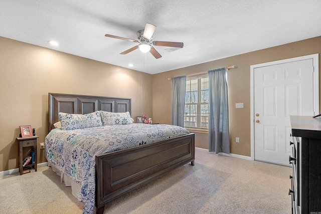 bedroom with baseboards, light colored carpet, ceiling fan, a textured ceiling, and recessed lighting