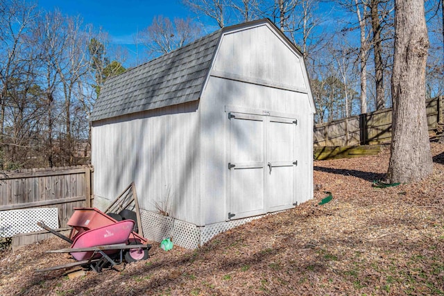 view of shed featuring a fenced backyard