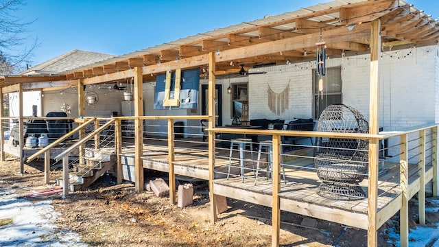 exterior space with brick siding and roof with shingles