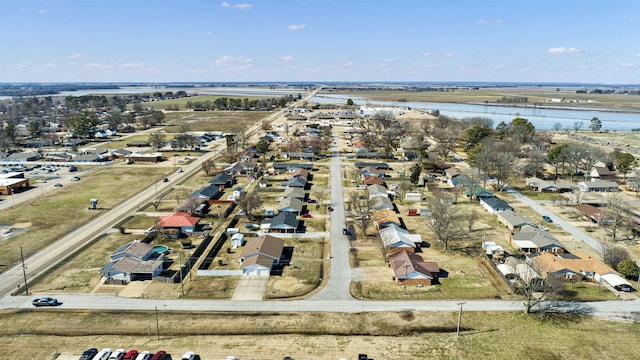 aerial view with a water view and a residential view