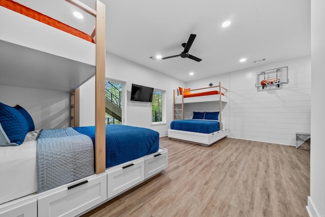 bedroom featuring light wood-style flooring, visible vents, a ceiling fan, and recessed lighting