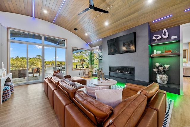 living room with light wood-style flooring, a fireplace, wood ceiling, a ceiling fan, and vaulted ceiling