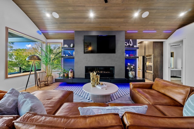 living area with a large fireplace, wood ceiling, vaulted ceiling, and wood finished floors