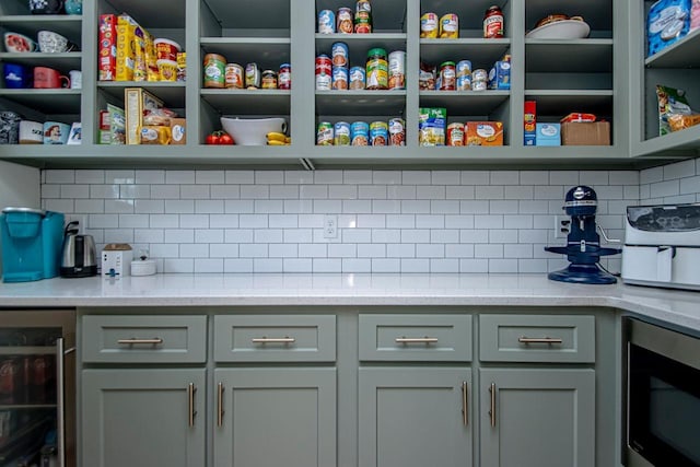 pantry featuring beverage cooler