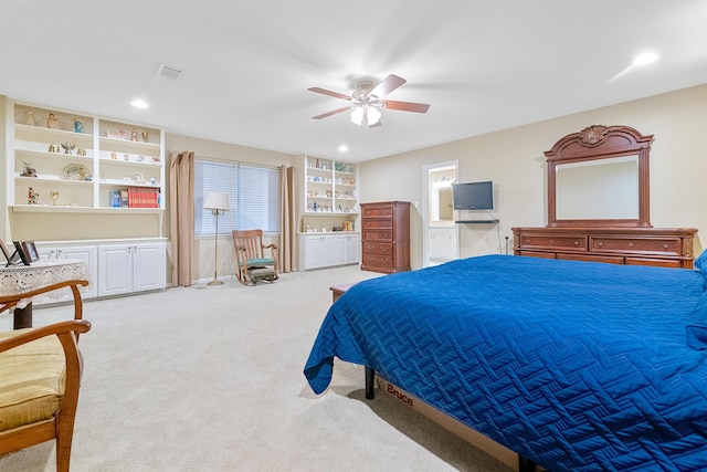 carpeted bedroom with a ceiling fan, connected bathroom, visible vents, and recessed lighting