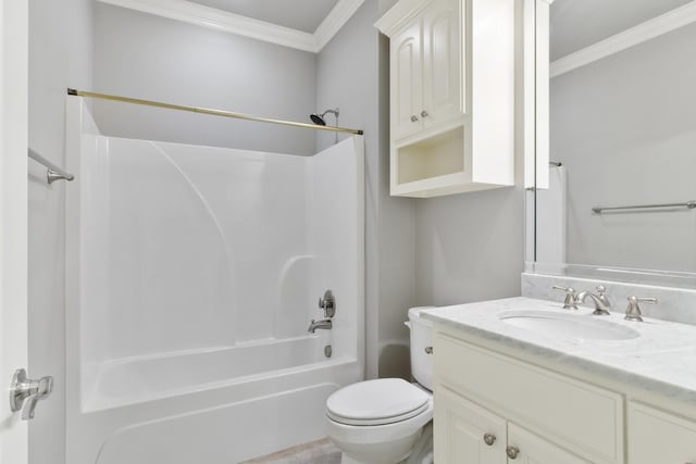 bathroom with toilet, crown molding, vanity, and shower / tub combination