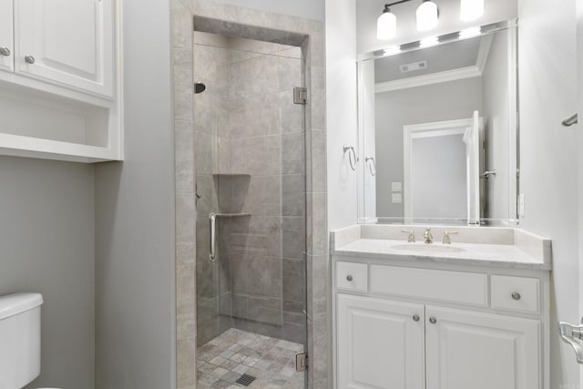 full bath featuring ornamental molding, a shower stall, and toilet