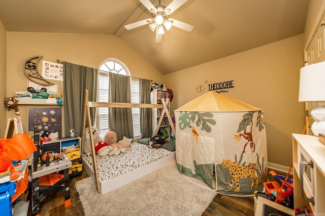 bedroom with vaulted ceiling, a ceiling fan, and wood finished floors