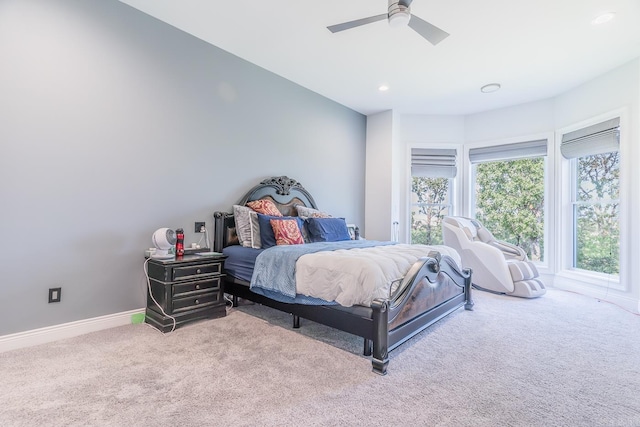 bedroom with light carpet, ceiling fan, recessed lighting, and baseboards