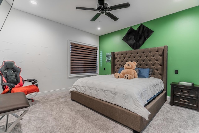 bedroom featuring light carpet, recessed lighting, a ceiling fan, and baseboards