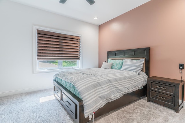 bedroom featuring light carpet, recessed lighting, a ceiling fan, and baseboards