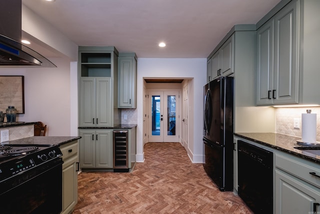 kitchen featuring wine cooler, exhaust hood, french doors, gray cabinets, and black appliances