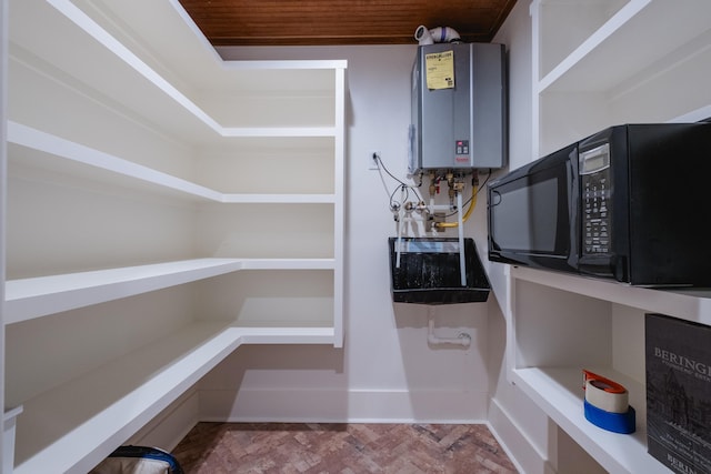 storage area featuring water heater