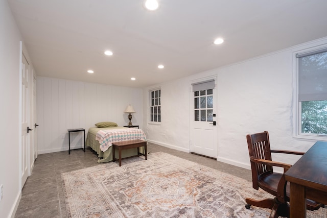 bedroom featuring baseboards and recessed lighting