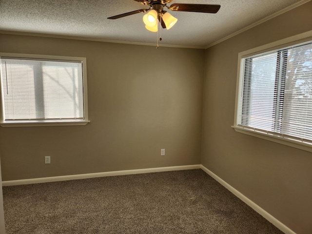 unfurnished room featuring carpet, baseboards, and a textured ceiling