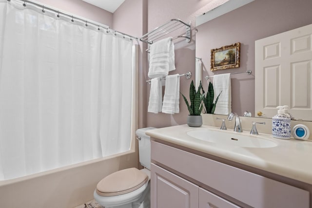 bathroom with vanity, toilet, and shower / bathtub combination with curtain