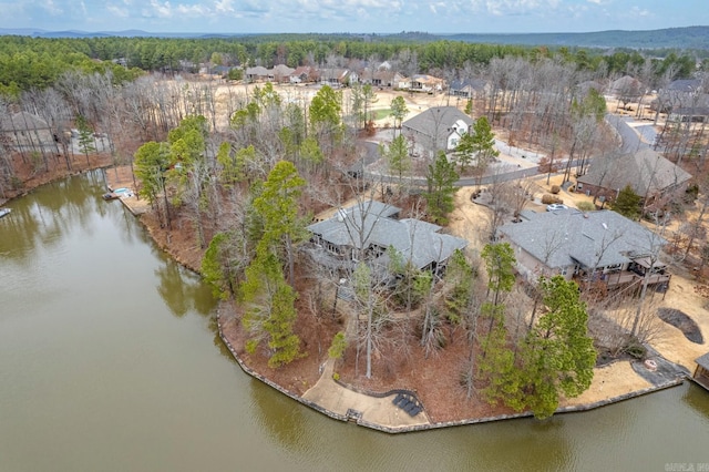 bird's eye view with a residential view and a water view