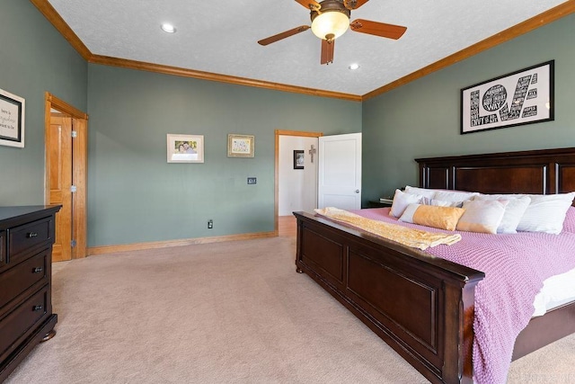 bedroom featuring a textured ceiling, recessed lighting, light colored carpet, baseboards, and ornamental molding