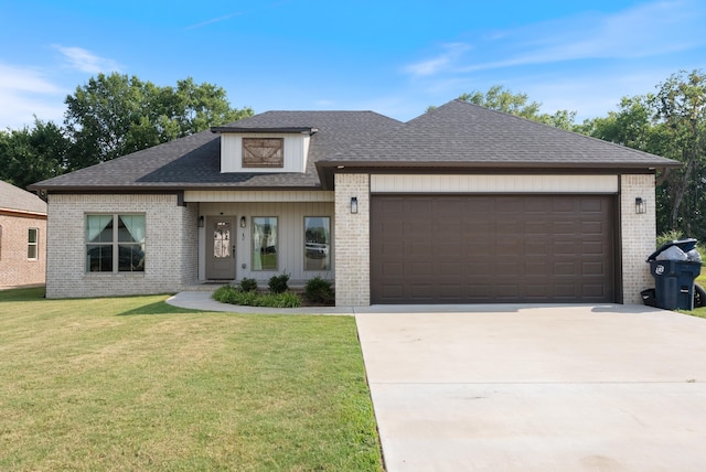 view of front of home with a garage, brick siding, driveway, roof with shingles, and a front lawn