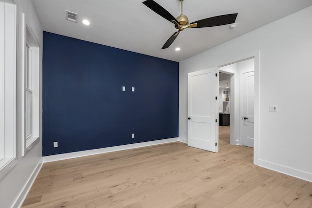 unfurnished bedroom with light wood-style flooring, recessed lighting, visible vents, a ceiling fan, and baseboards