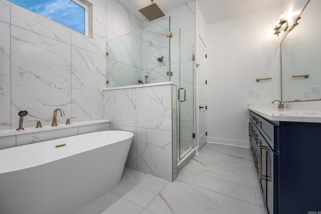 full bathroom with a freestanding tub, marble finish floor, a marble finish shower, and vanity