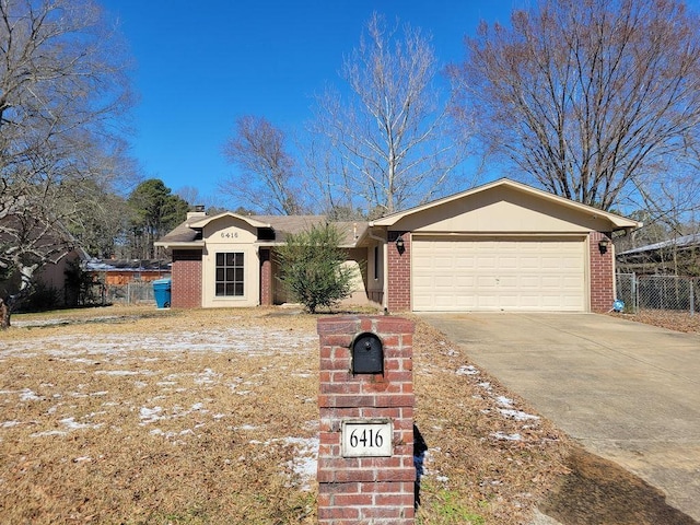 single story home featuring a garage, driveway, brick siding, and a chimney