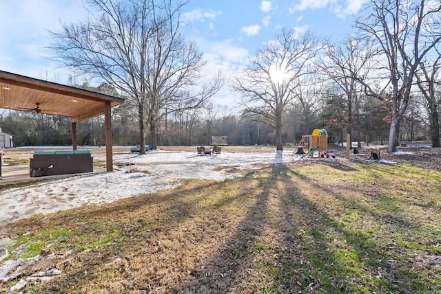 view of yard featuring playground community