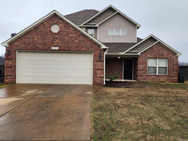 view of front of home featuring driveway, a garage, roof with shingles, a front lawn, and brick siding