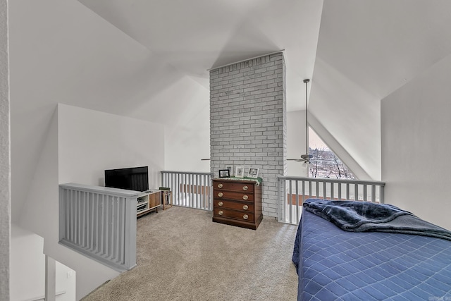 bedroom with light carpet and vaulted ceiling