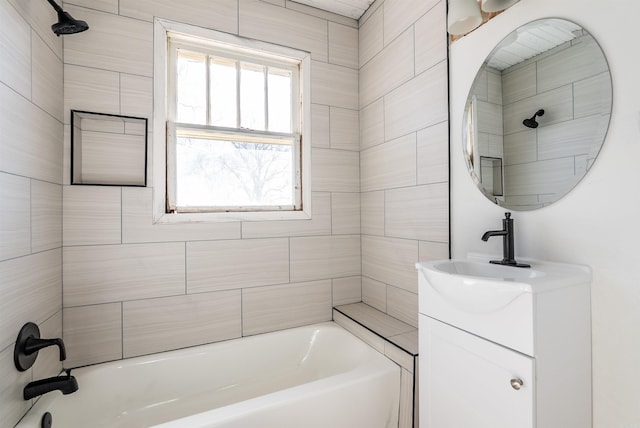 full bath featuring plenty of natural light, bathtub / shower combination, and vanity