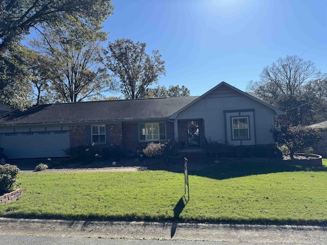 ranch-style house with a garage, brick siding, and a front lawn