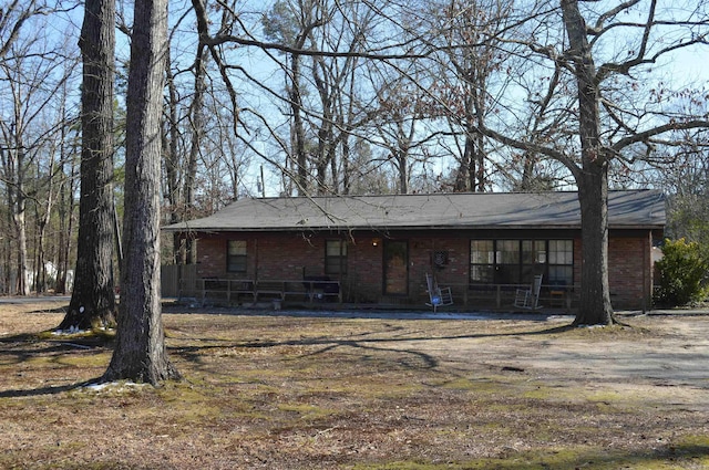 view of front of home with brick siding