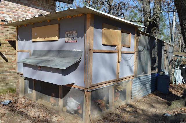 exterior space featuring brick siding