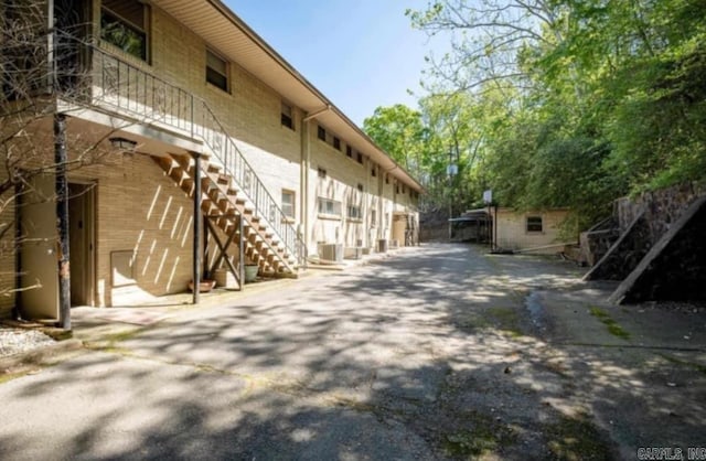 view of home's exterior with stairway
