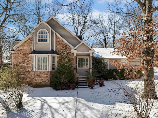 view of front facade featuring brick siding