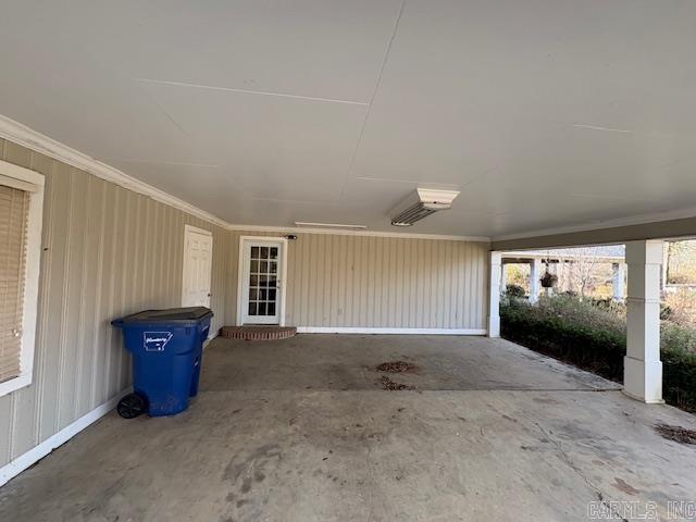 garage featuring a carport