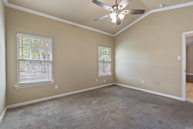 empty room with light carpet, baseboards, a ceiling fan, lofted ceiling, and crown molding