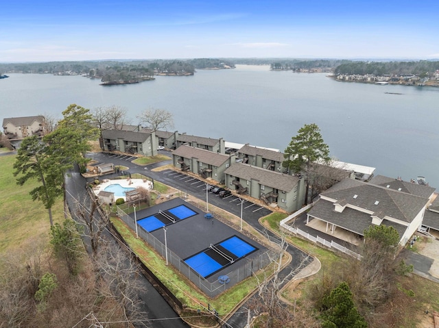 aerial view featuring a water view and a residential view