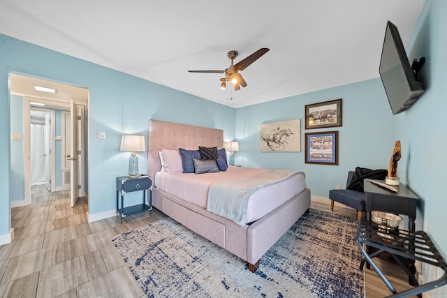 bedroom featuring ceiling fan and baseboards