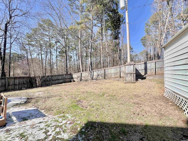 view of yard featuring a fenced backyard