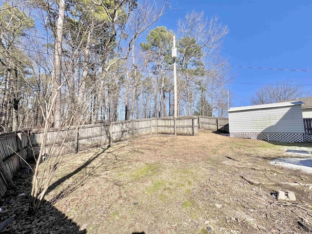 view of yard featuring a fenced backyard