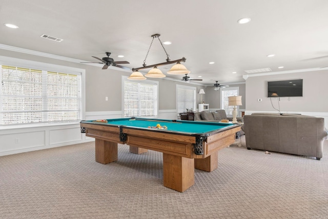 game room featuring a wainscoted wall, recessed lighting, light colored carpet, visible vents, and ornamental molding