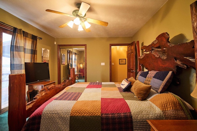 bedroom featuring ceiling fan and a closet