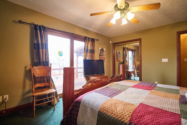 bedroom with ceiling fan, dark colored carpet, and a closet