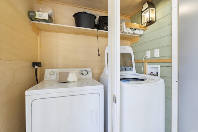 laundry area featuring laundry area and washer and clothes dryer