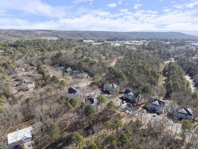 bird's eye view featuring a forest view