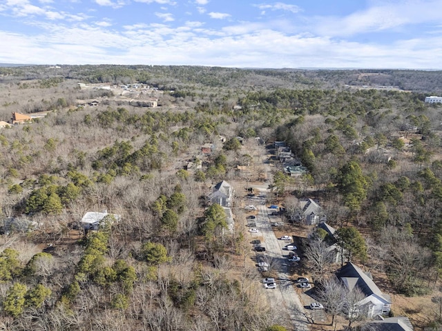 aerial view featuring a view of trees