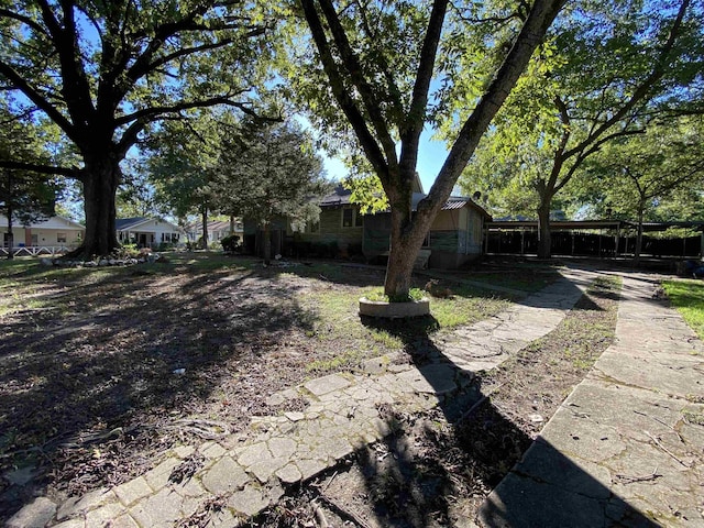 view of yard featuring a carport