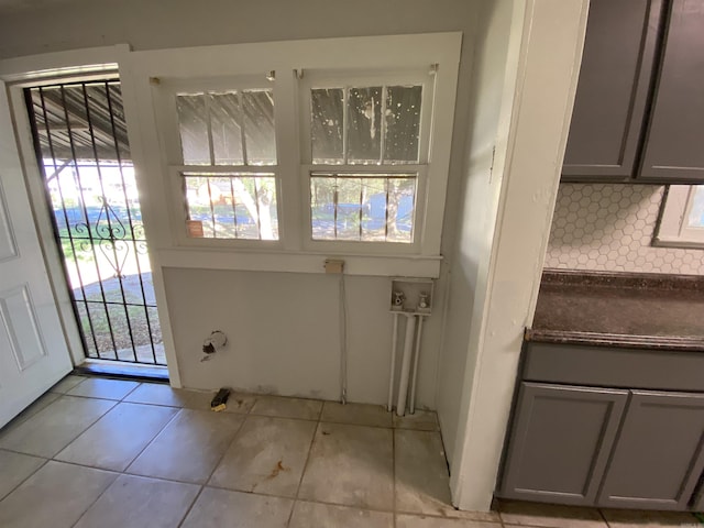 entryway featuring light tile patterned flooring