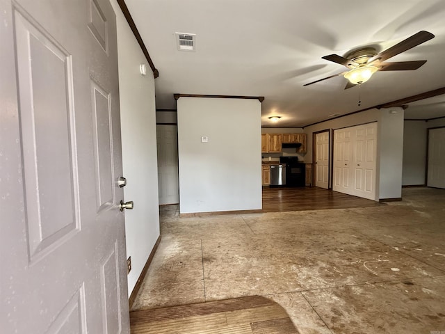 unfurnished living room with a ceiling fan, visible vents, crown molding, and baseboards